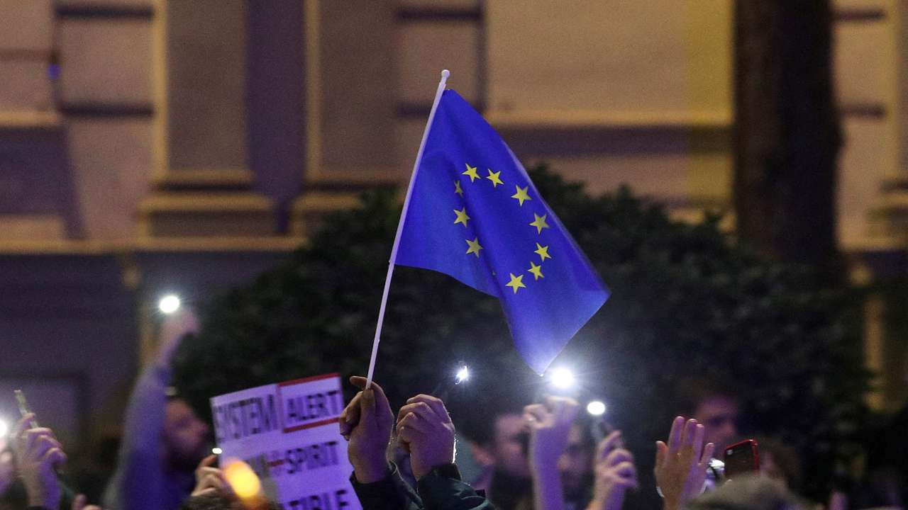 FILE PHOTO: Protesters gather outside Georgian parliament after disputed election