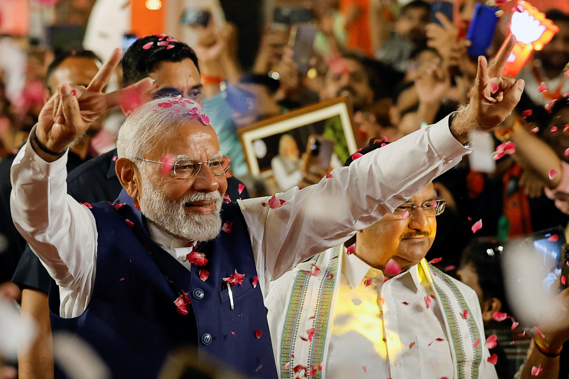 Indian PM Modi speaks to supporters at BJP headquarters, in New Delhi