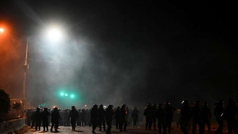Police clash with the supporters of Morales during protests, in Cochabamba