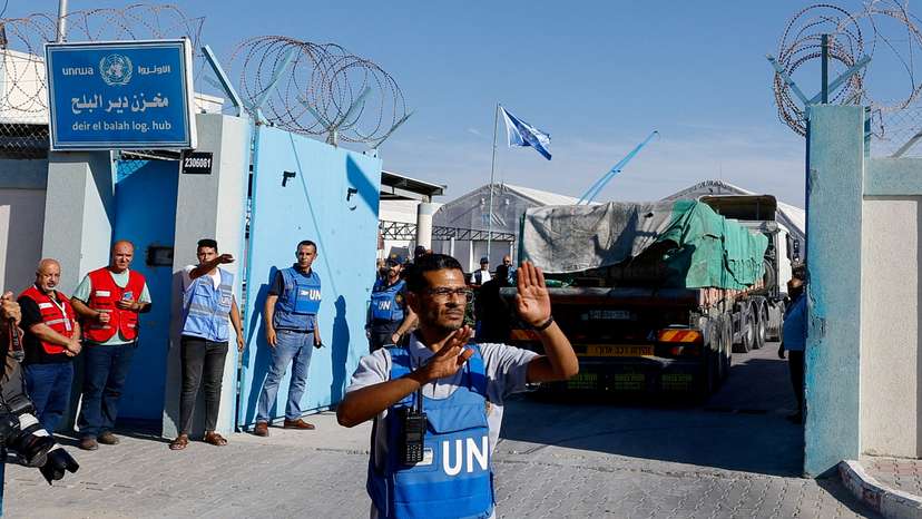 FILE PHOTO: Aid trucks arrive at a UN storage facility in the central Gaza Strip