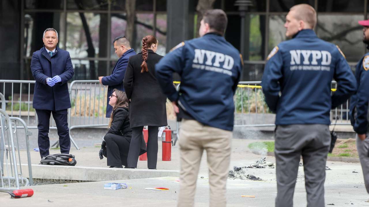 Aftermath of a person covered in flames outside NY courthouse of former U.S. President Trump's criminal hush money trial