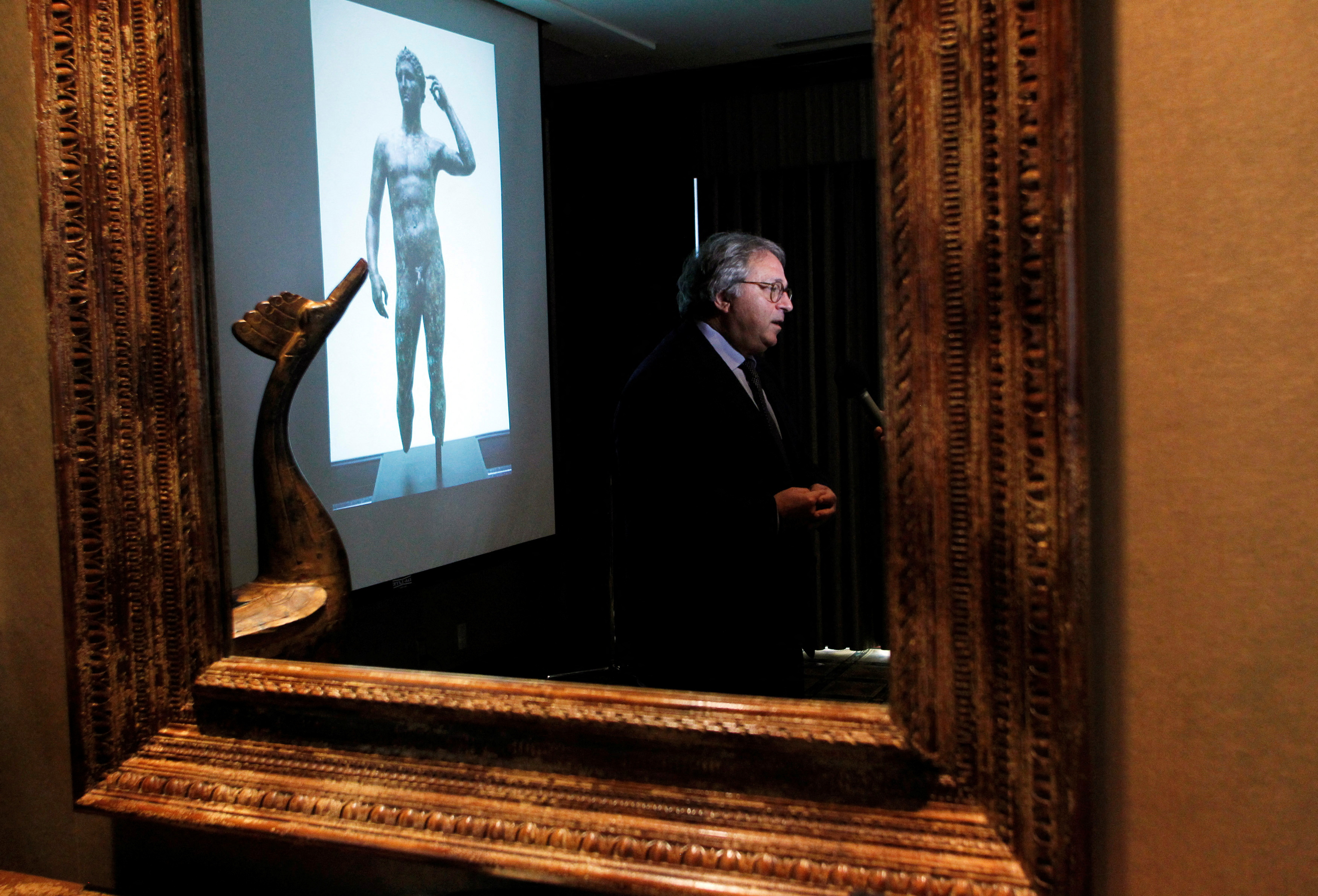 FILE PHOTO: Gian Mario Spacca is seen reflected in a mirror while being interviewed in Los Angeles