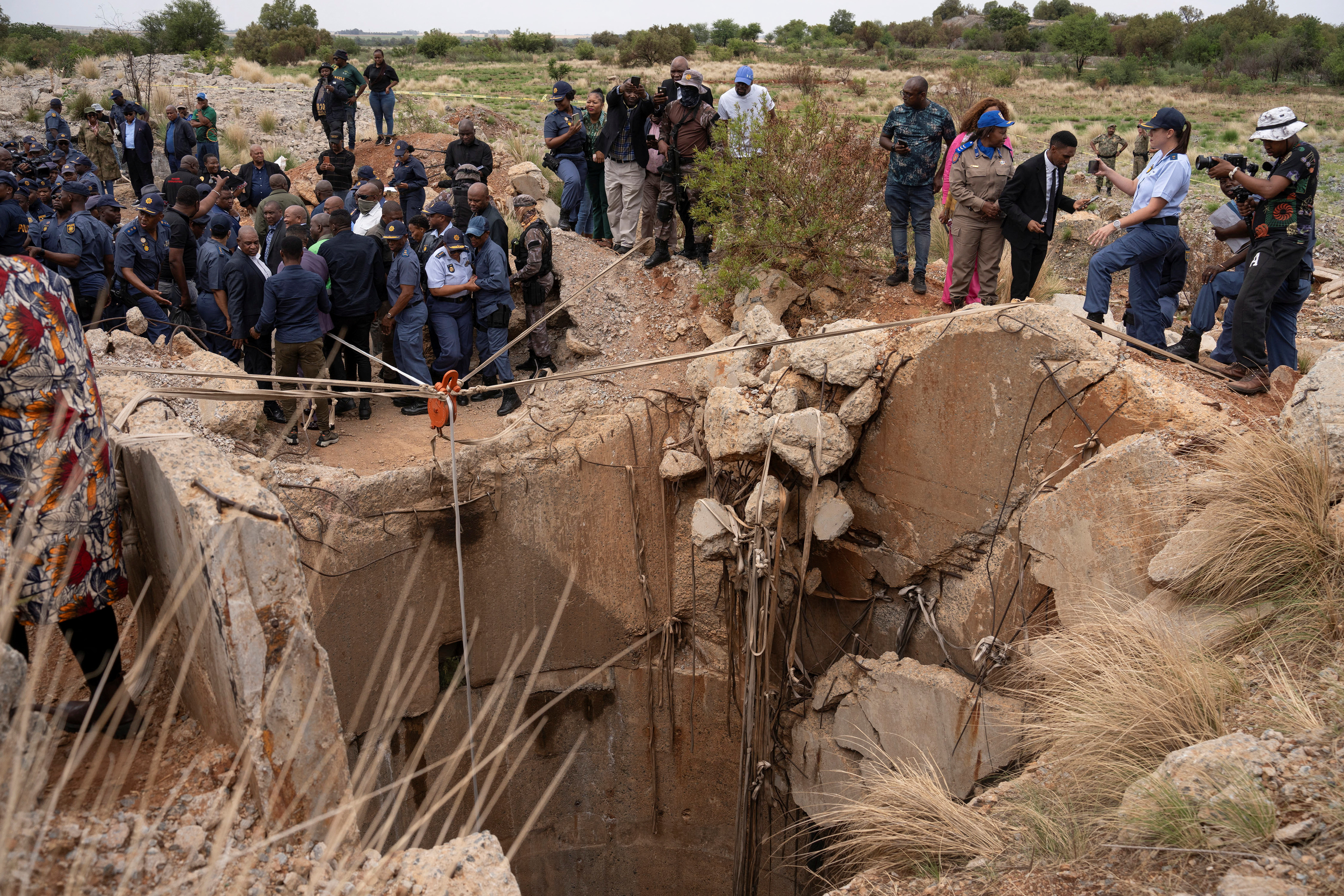 South African police in standoff with hundreds of illegal miners in disused shaft