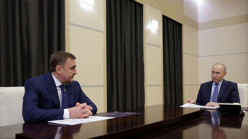 FILE PHOTO: Russian President Vladimir Putin meets with Tula Region Governor Alexei Dyumin at a residence outside Moscow