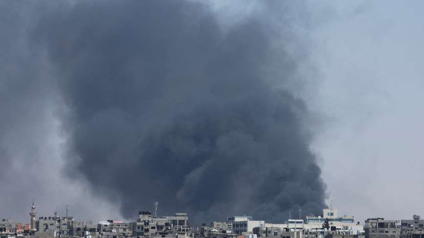 Smoke rises during an Israeli air strike, in Rafah