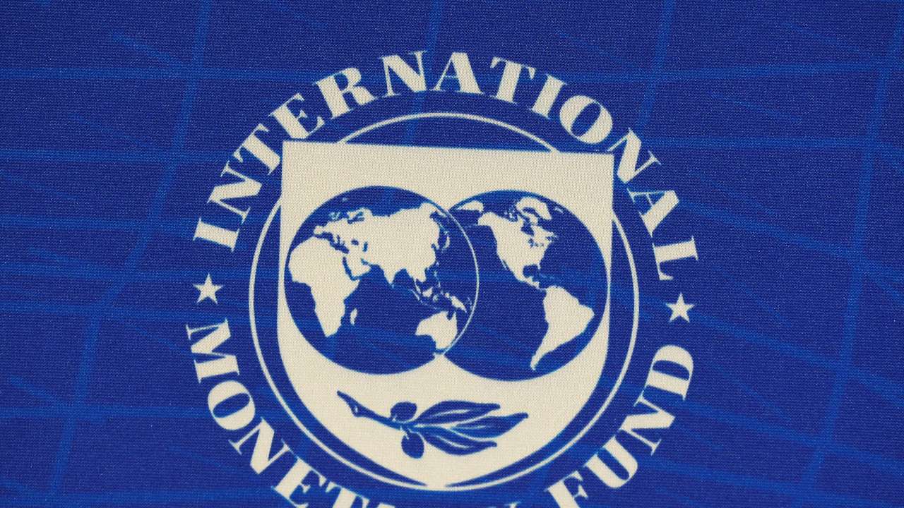 The logo of the International Monetary Fund (IMF), is seen during a news conference in Santiago