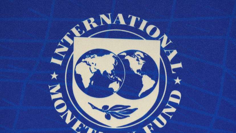 The logo of the International Monetary Fund (IMF), is seen during a news conference in Santiago