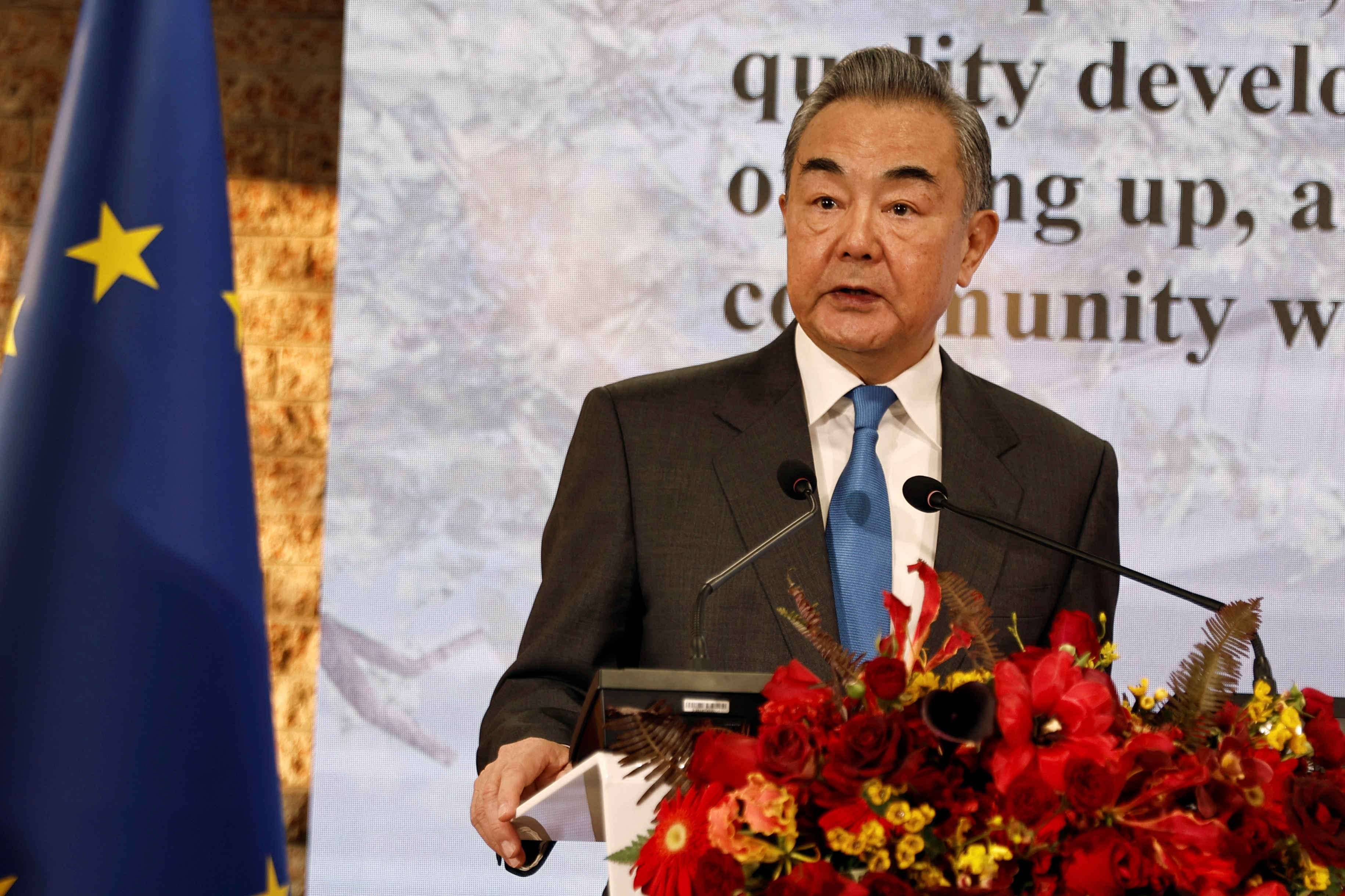 FILE PHOTO: Chinese Foreign Minister Wang Yi speaks at the Belgian embassy in Beijing