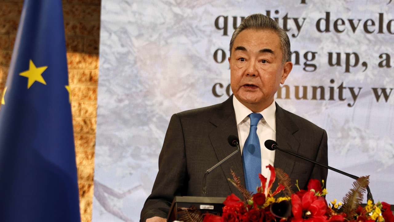 FILE PHOTO: Chinese Foreign Minister Wang Yi speaks at the Belgian embassy in Beijing