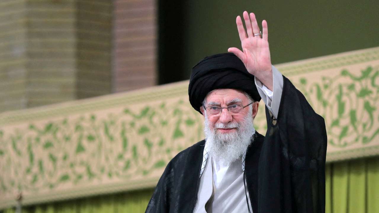 FILE PHOTO: Iran's Supreme Leader Ayatollah Ali Khamenei waves during a meeting with students in Tehran