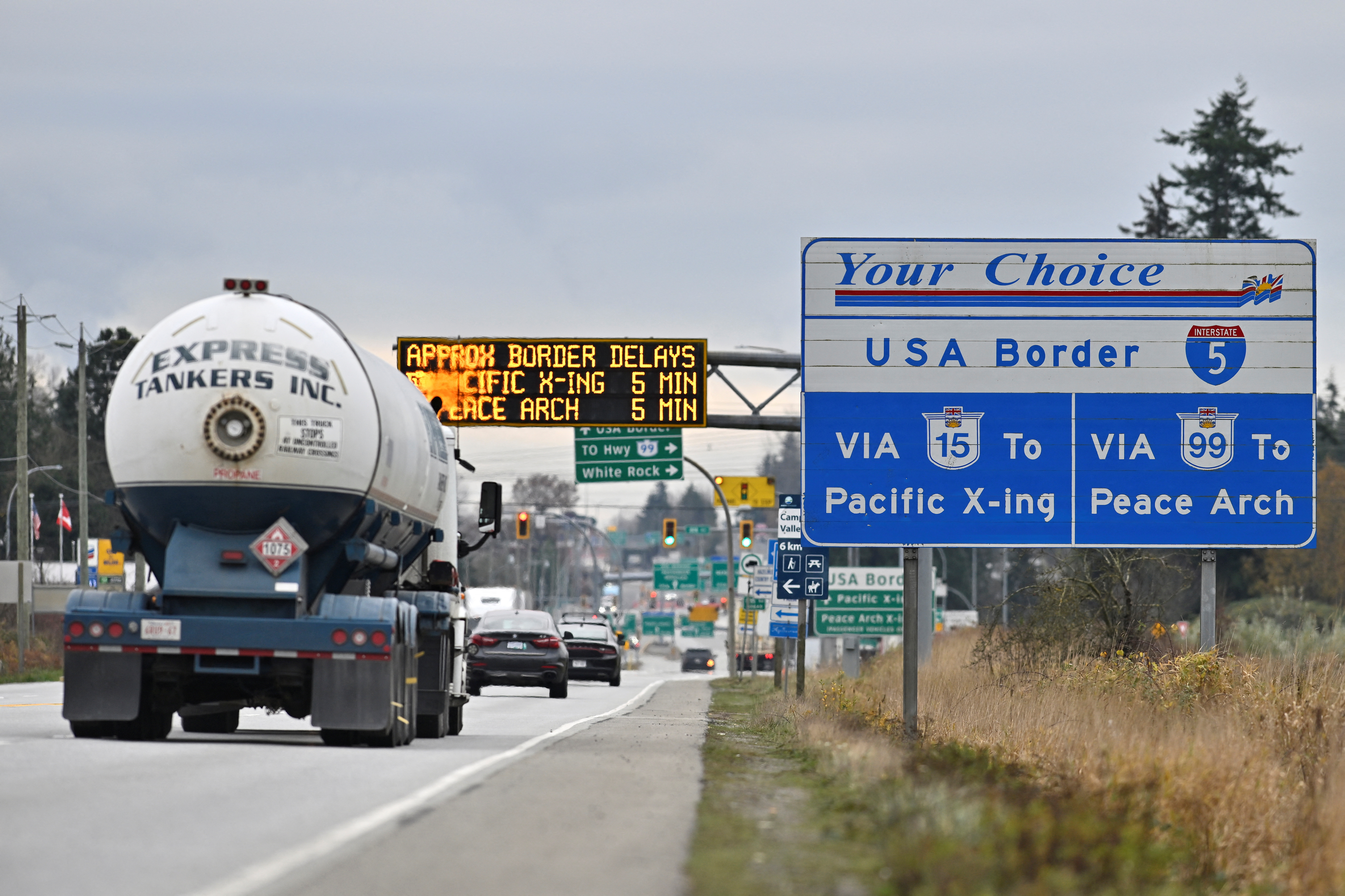 Commercial trucks head from Canada towards the U.S. Customs and Border Protection (CBP) Pacific Highway Port of Entry