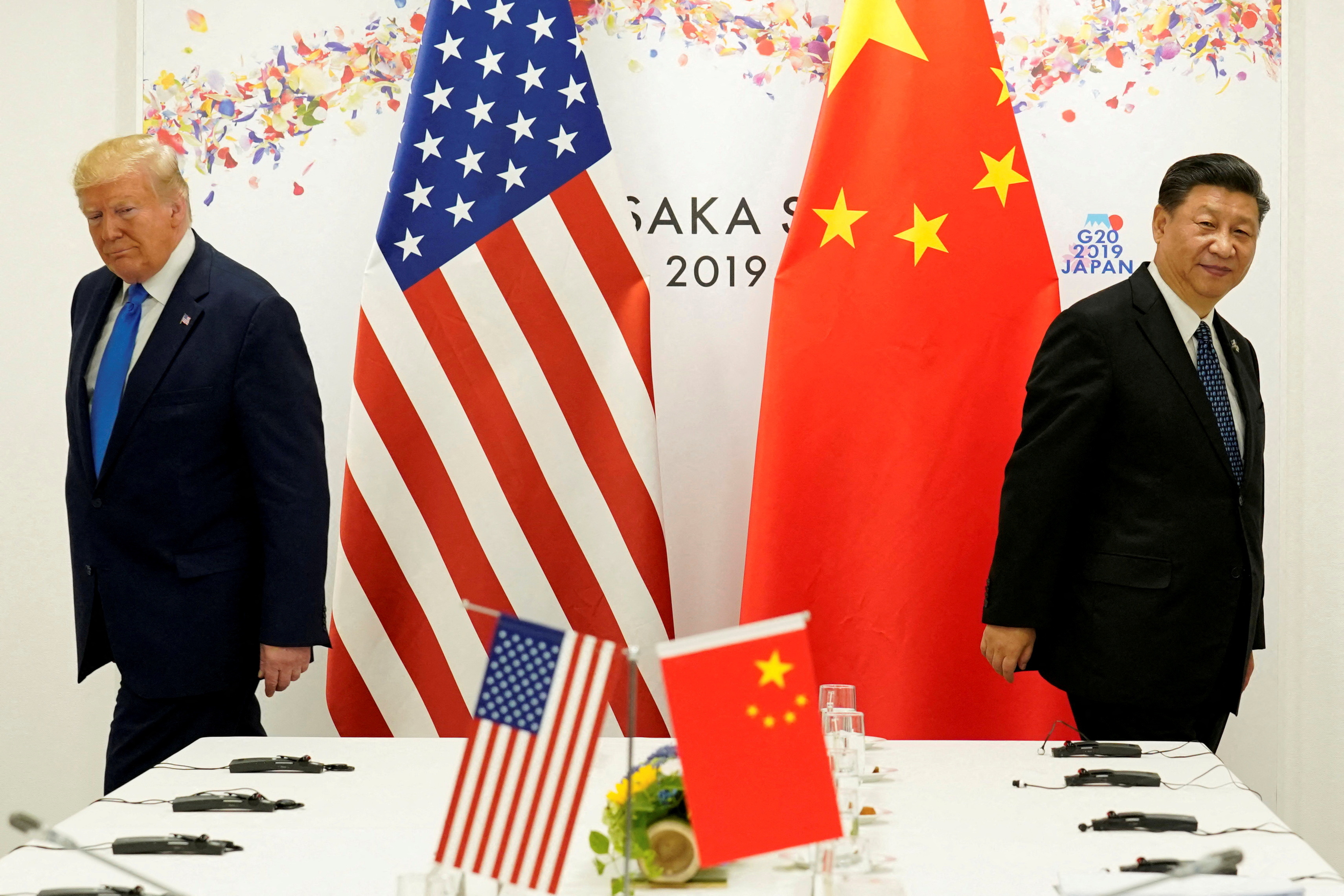 FILE PHOTO: Trump and Xi are pictured in Japan in 2019