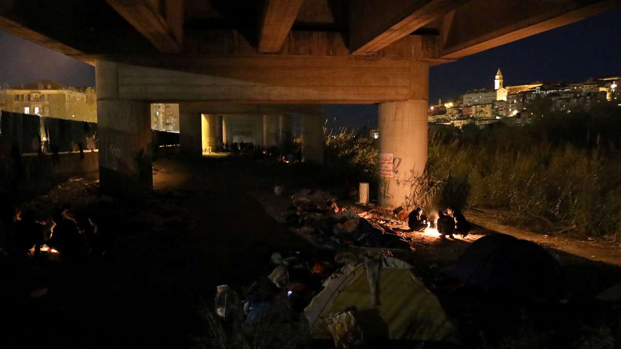 FILE PHOTO: Migrants risk death crossing Alps to reach France