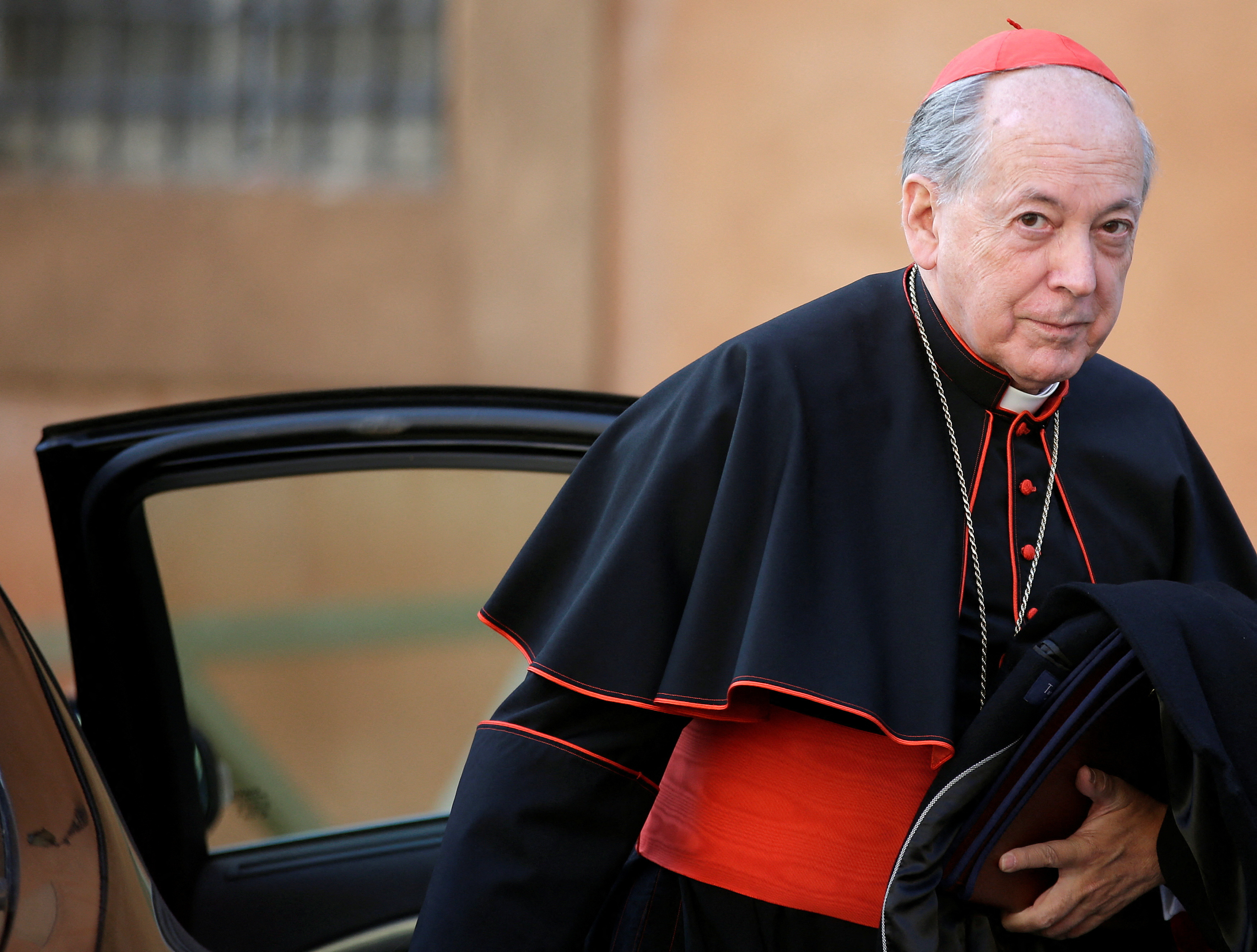 FILE PHOTO: Peruvian Cardinal Cipriani Thorne arrives for a meeting at the Synod Hall in the Vatican