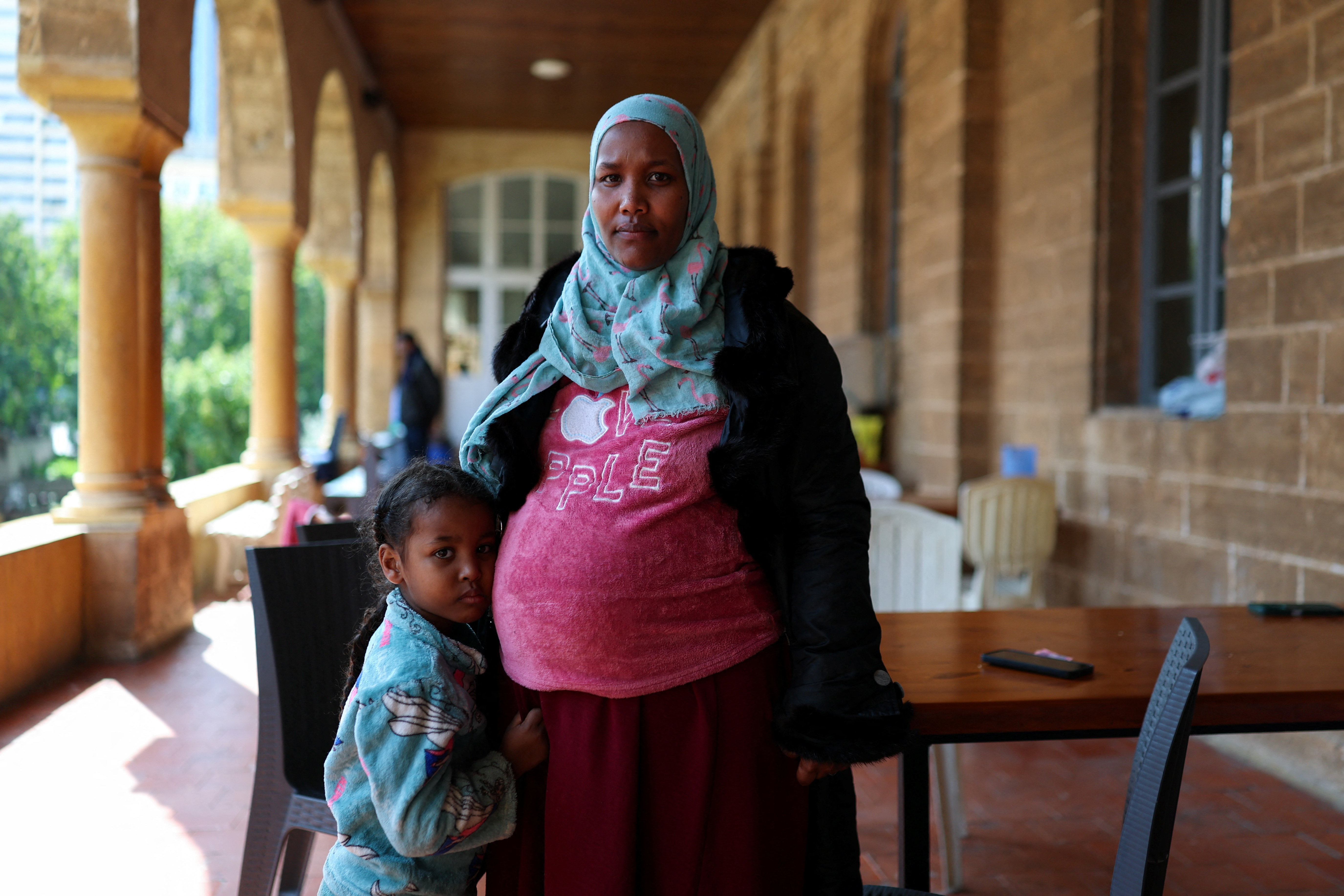 Refugees and displaced migrant workers shelter in St. Joseph Church, following an escalation between Hezbollah and Israel amid the U.S.-Israeli conflict with Iran, in Beirut