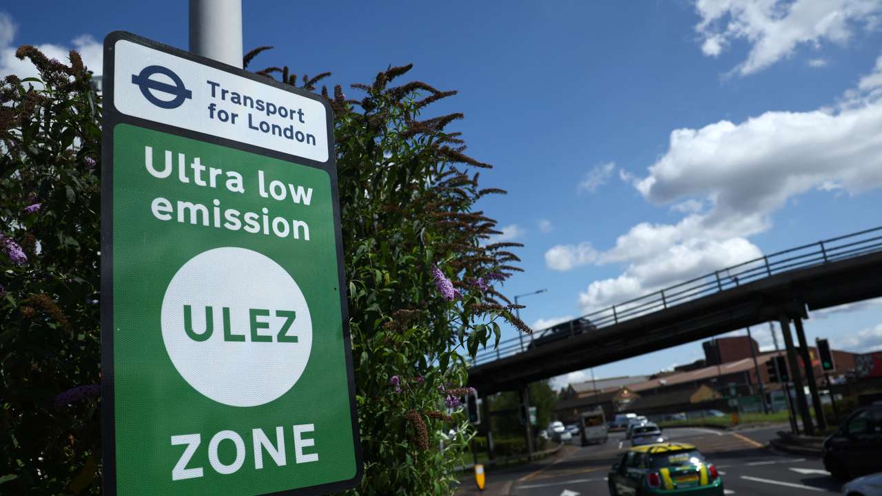 FILE PHOTO: Signage along existing boundary of London's Ultra Low Emissions Zone (ULEZ) zone ahead of proposed upcoming expansion, in London