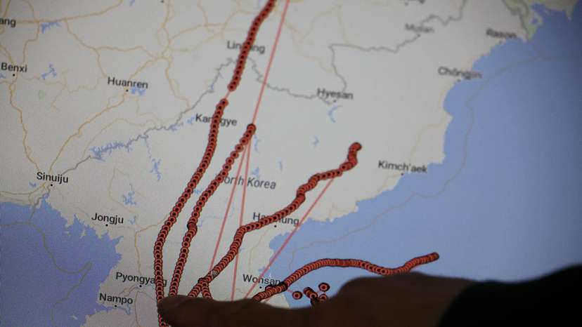 A monitor shows GPS tracking routes of balloons to distribute anti-North Korean leaflets over North Korean territory