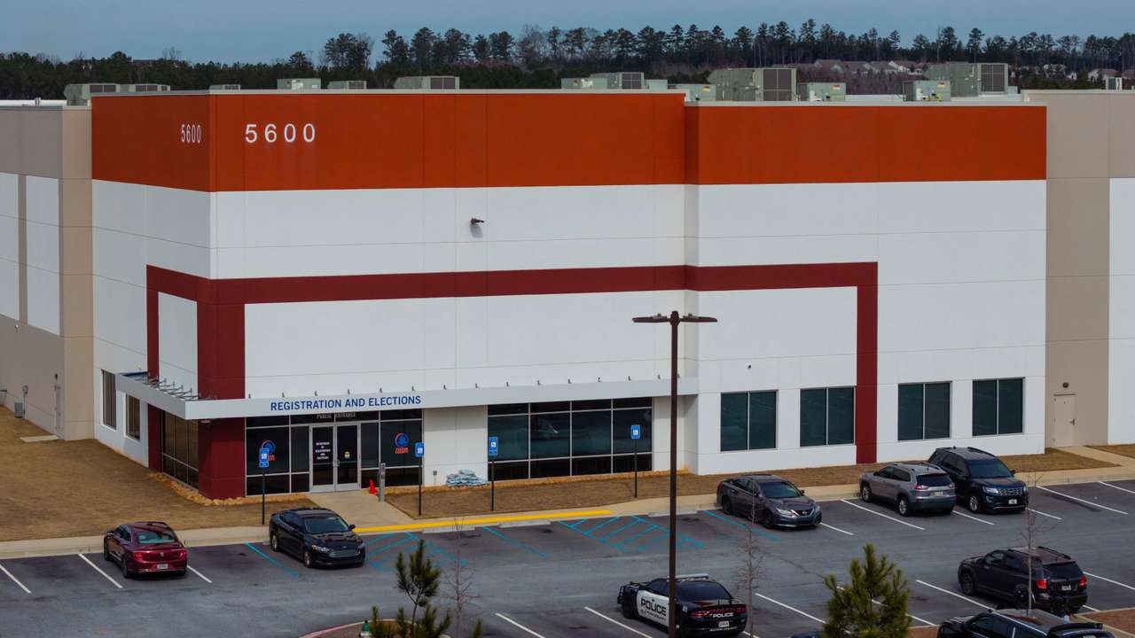 A drone picture shows the Fulton County Election Hub and Operation Center a day after the FBI executed a search warrant in Georgia