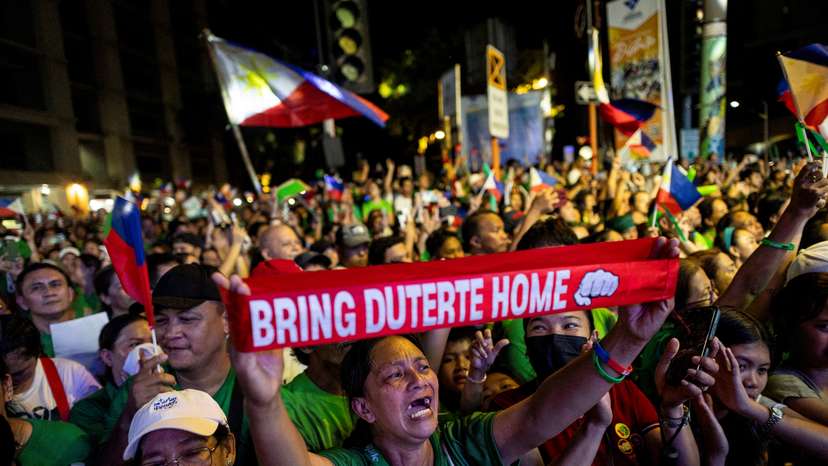 FILE PHOTO: In custody in the Hague, on ballot at home: Duterte's grip on Philippines endures