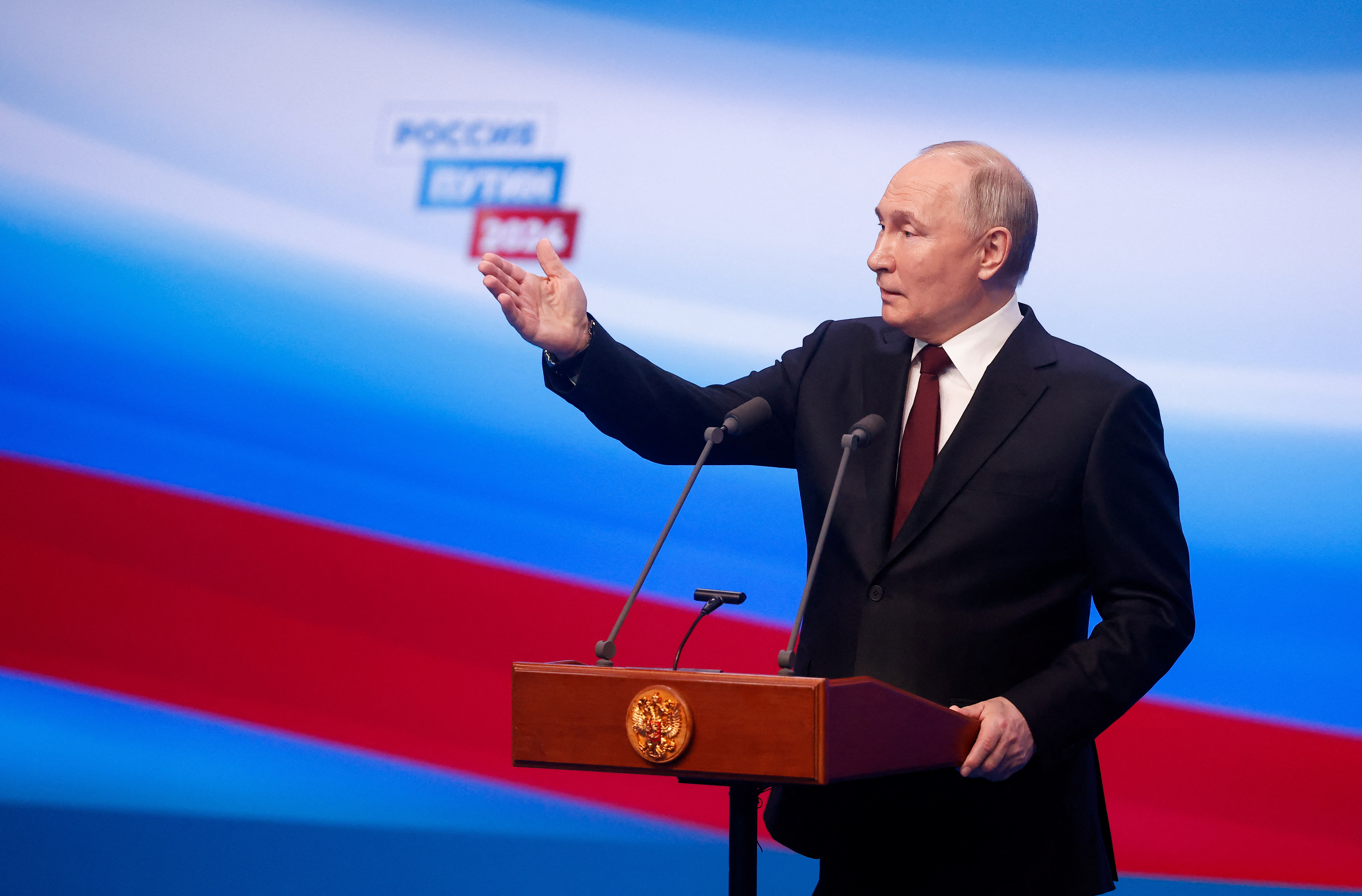 Russian incumbent President Putin speaks after polling stations closed, in Moscow