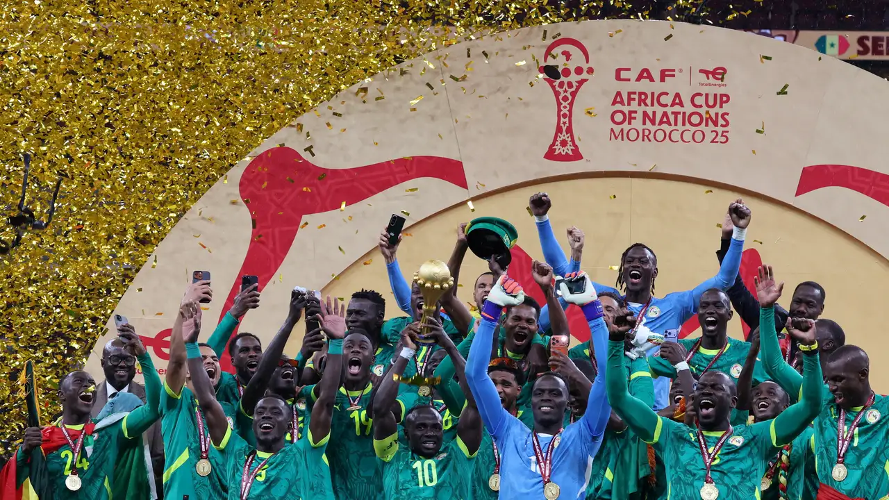 Soccer Football - CAF Africa Cup of Nations - Morocco 2025 - Final - Senegal v Morocco - Prince Moulay Abdellah Stadium, Rabat, Morocco - January 18, 2026 Senegal's Sadio Mane lifts the trophy with teammates as they celebrate after winning the Africa Cup of Nations REUTERS/Amr Abdallah Dalsh TPX IMAGES OF THE DAY