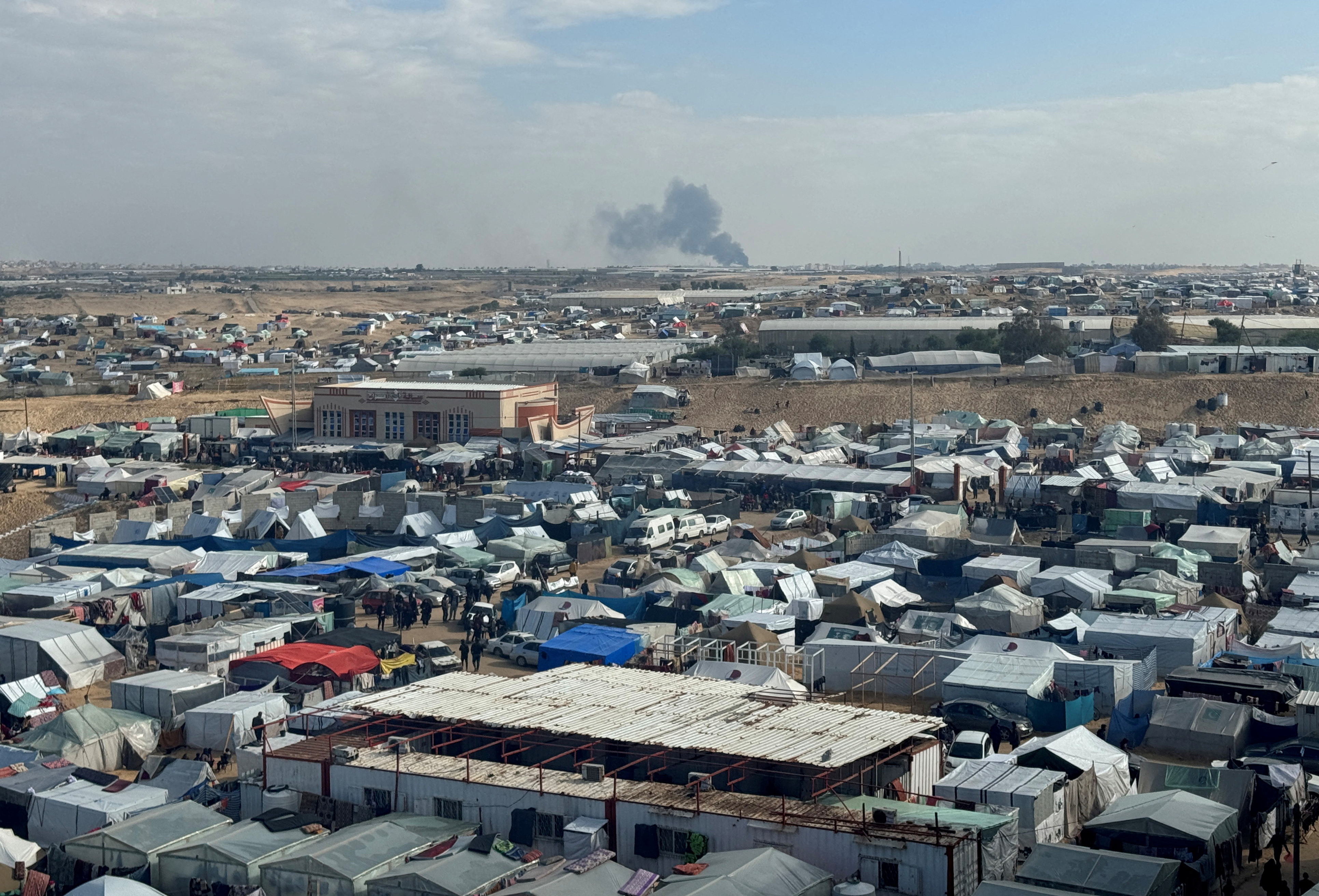 Smoke rises during an Israeli ground operation in Khan Younis