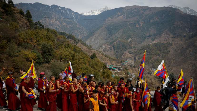 FILE PHOTO: Tibetan participate in a march to mark the 65th anniversary of the uprising in Dharamsala