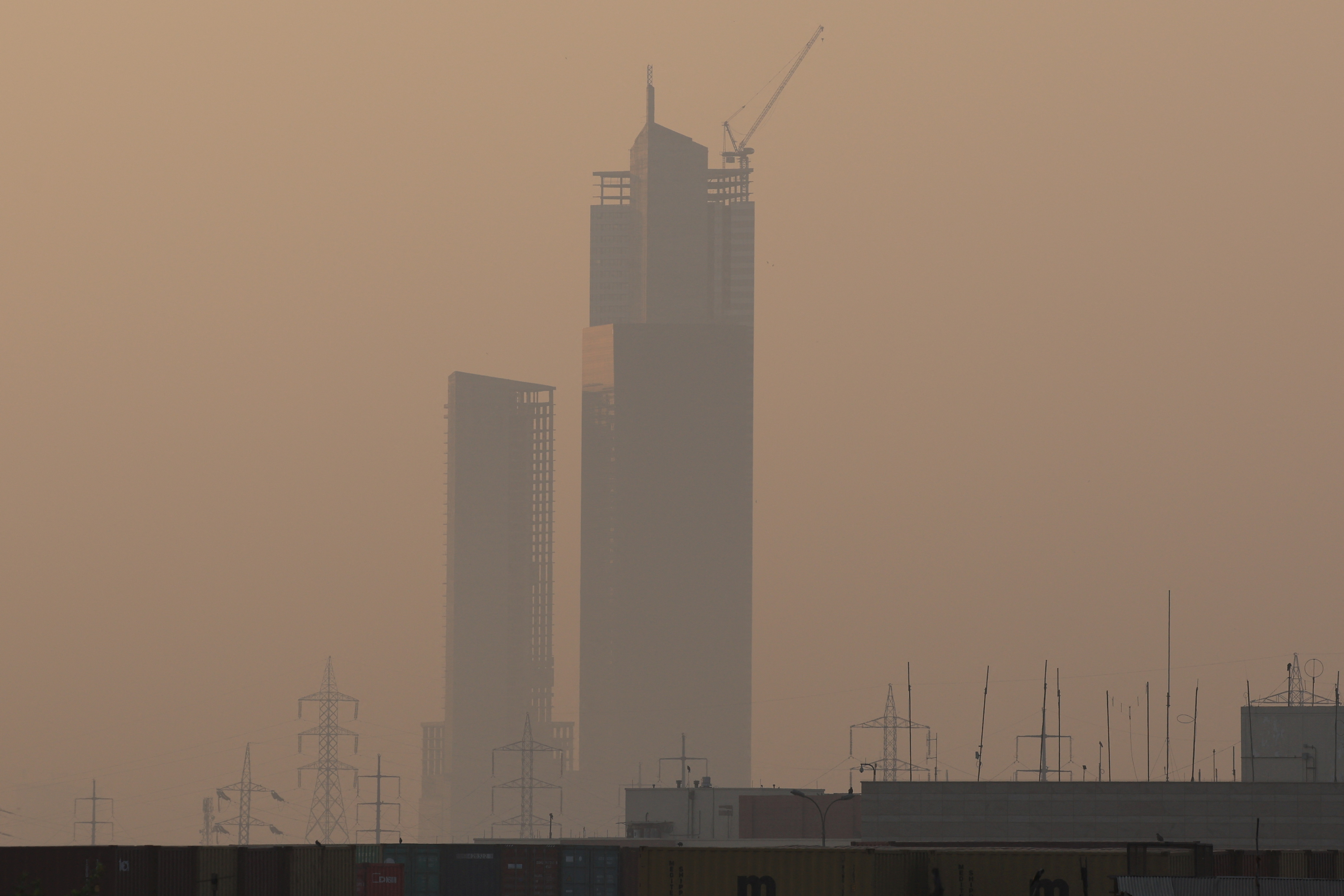 The 62-storey tower at the Bahria Icon Tower complex is seen through smog and air pollution on a morning in Karachi