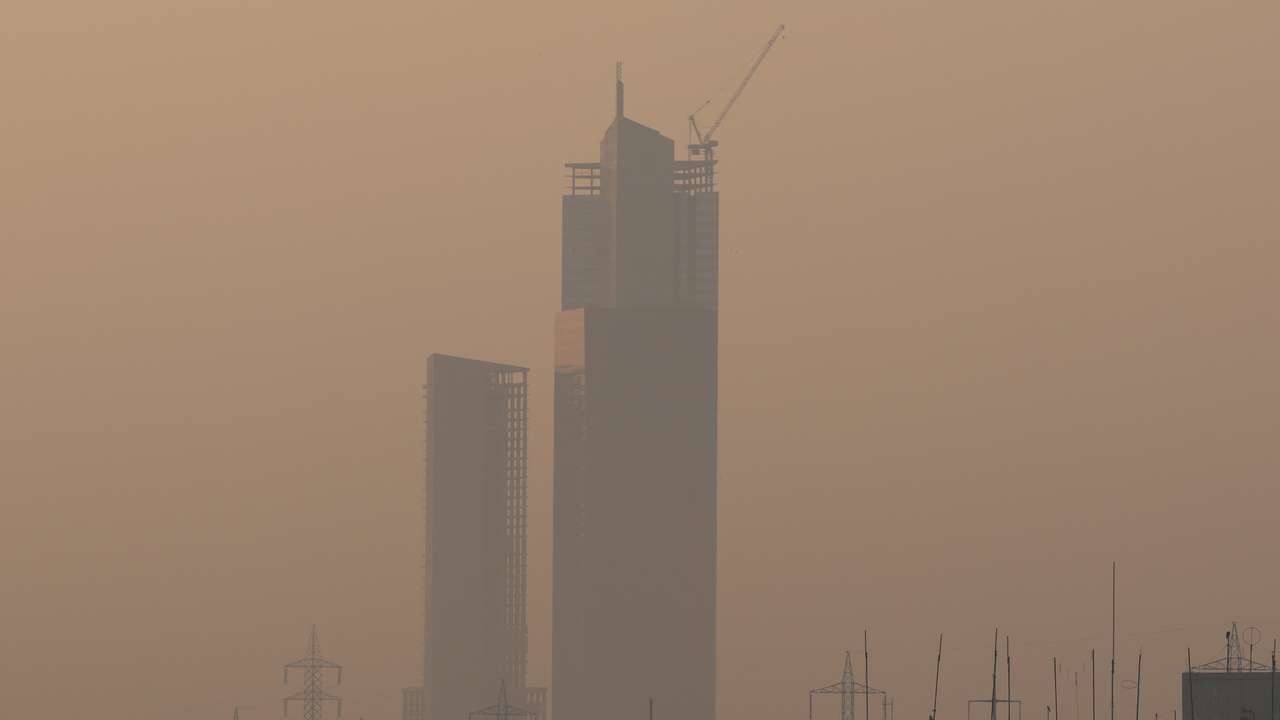 The 62-storey tower at the Bahria Icon Tower complex is seen through smog and air pollution on a morning in Karachi