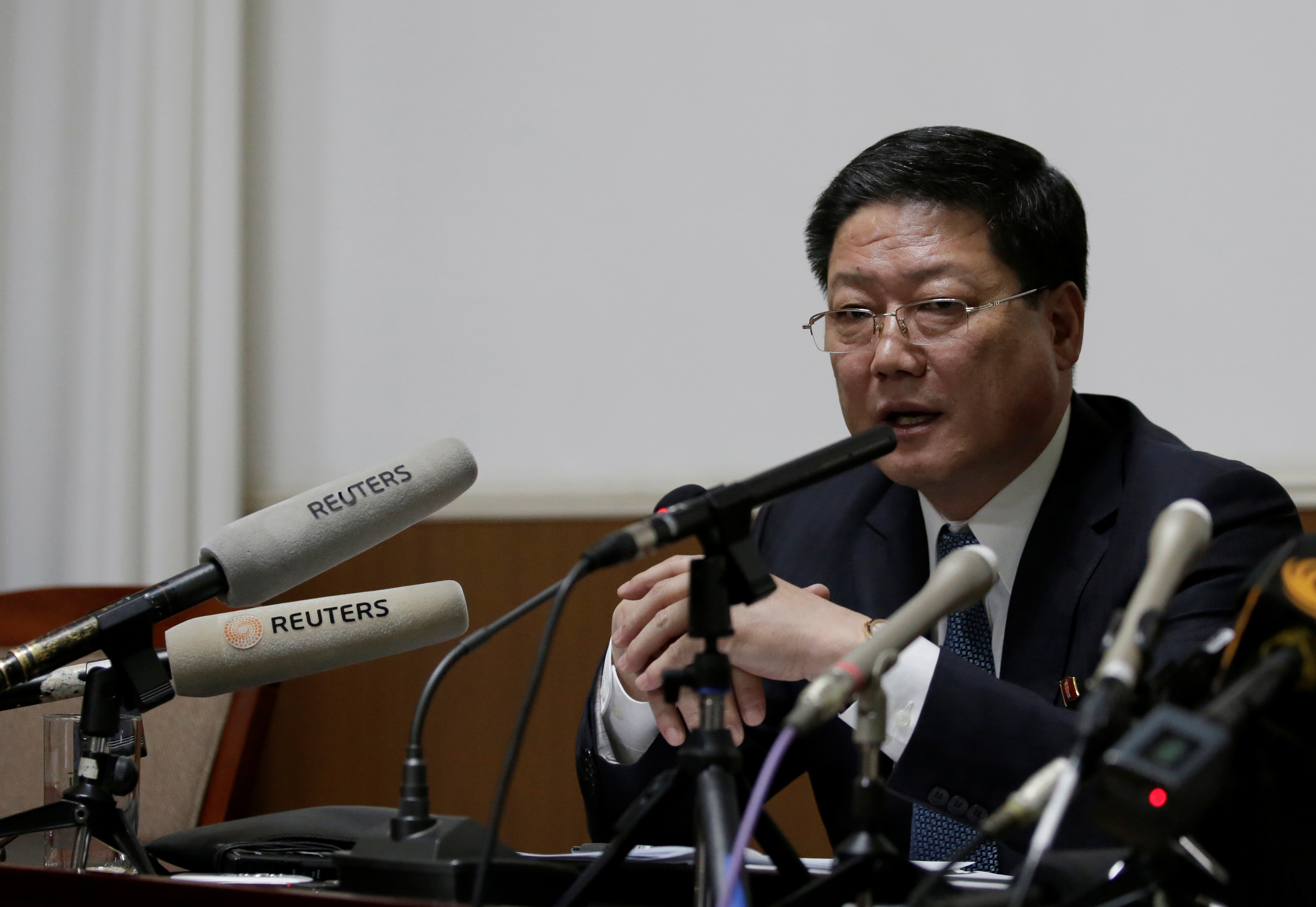 North Korean diplomat Pak Myong Ho attends a news conference in Beijing