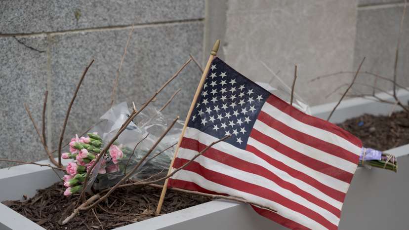 A makeshift memorial a day after two National Guard members were shot, in Washington