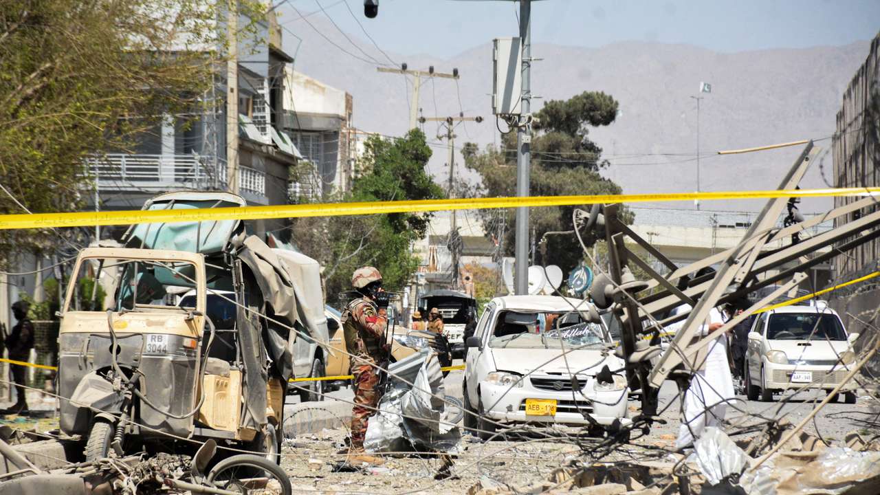 Paramilitary soldier stands amid the debris after a bomb blast near the Frontier Corps headquarters in Quetta
