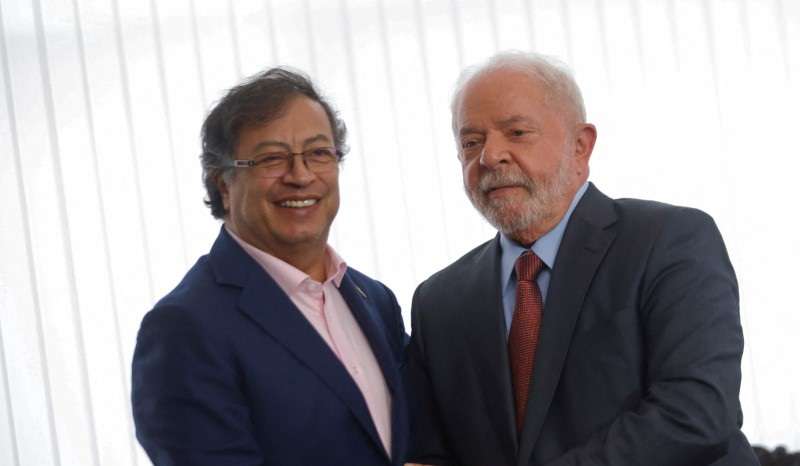 Brazil's President Luiz Inacio Lula da Silva holds hands with Colombian President Gustavo Petro during a bilateral meeting at the Itamaraty Palace in Brasilia
