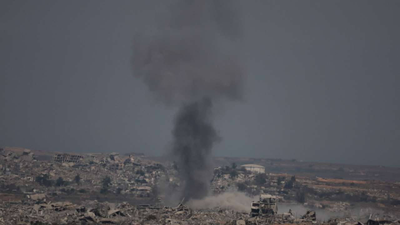 Smoke rises after an Israeli air strike in north Gaza, as seen from Israel's border with Gaza