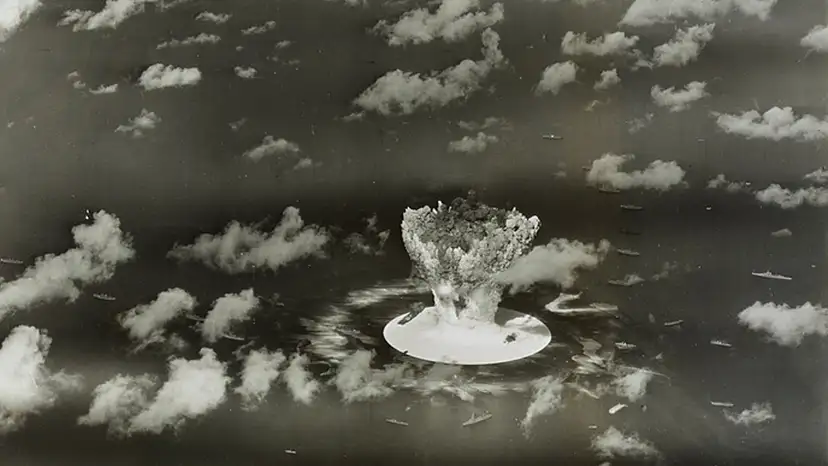 FILE PHOTO: Handout of a mushroom cloud rises with ships below during Operation Crossroads nuclear weapons test on Bikini Atoll
