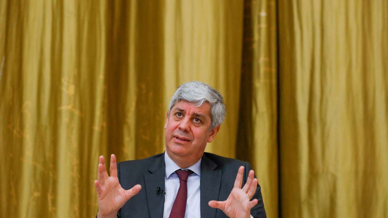 FILE PHOTO: ECB governing council member Mario Centeno speaks during an interview with Reuters, in Lisbon