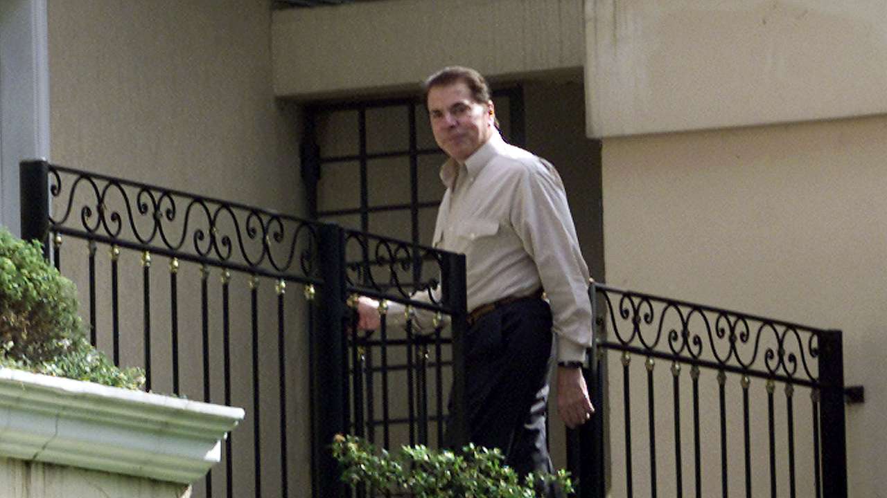 BRAZILIAN MEDIA MOGUL SANTOS IN FRONT OF HIS HOUSE IN SAO PAULO.