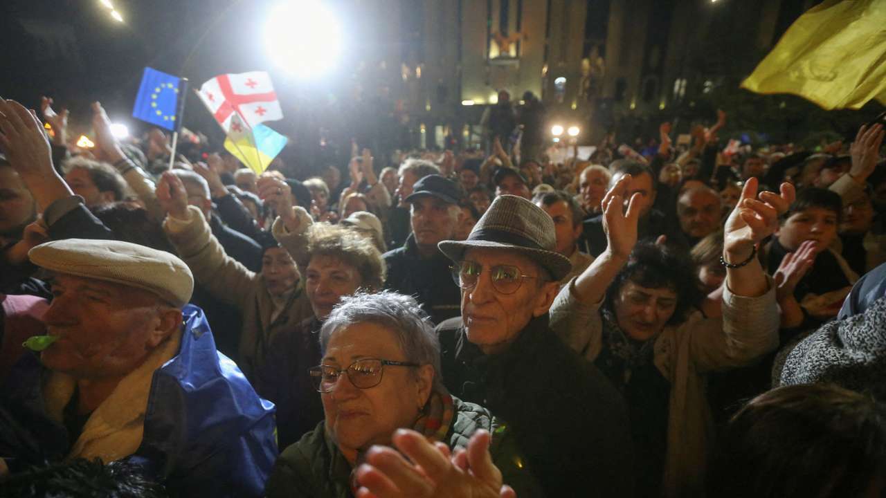 FILE PHOTO: Protesters gather outside Georgian parliament after disputed election