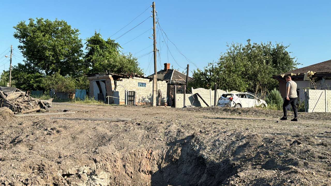 Aftermath of a Russian missile attack in the village of Budy