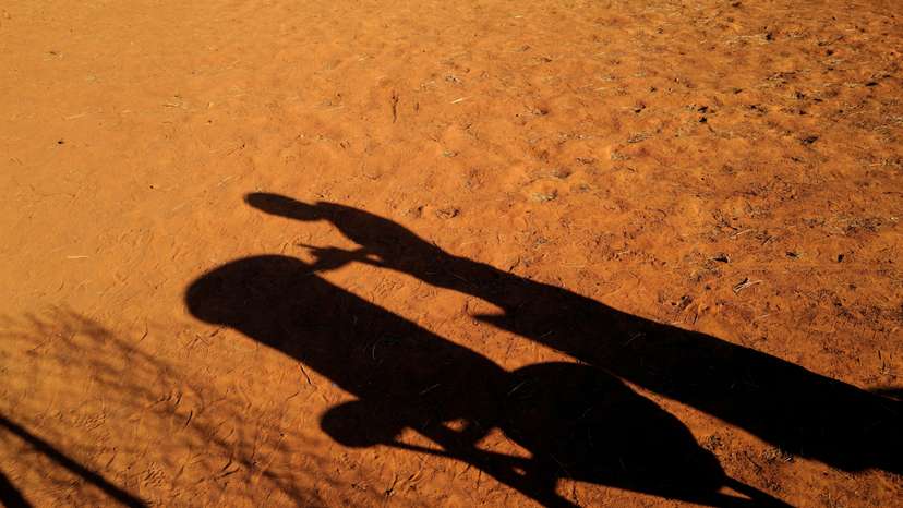 FILE PHOTO: The shadow of a child is seen at a camp for internally displaced people (IDPs) in Kaya