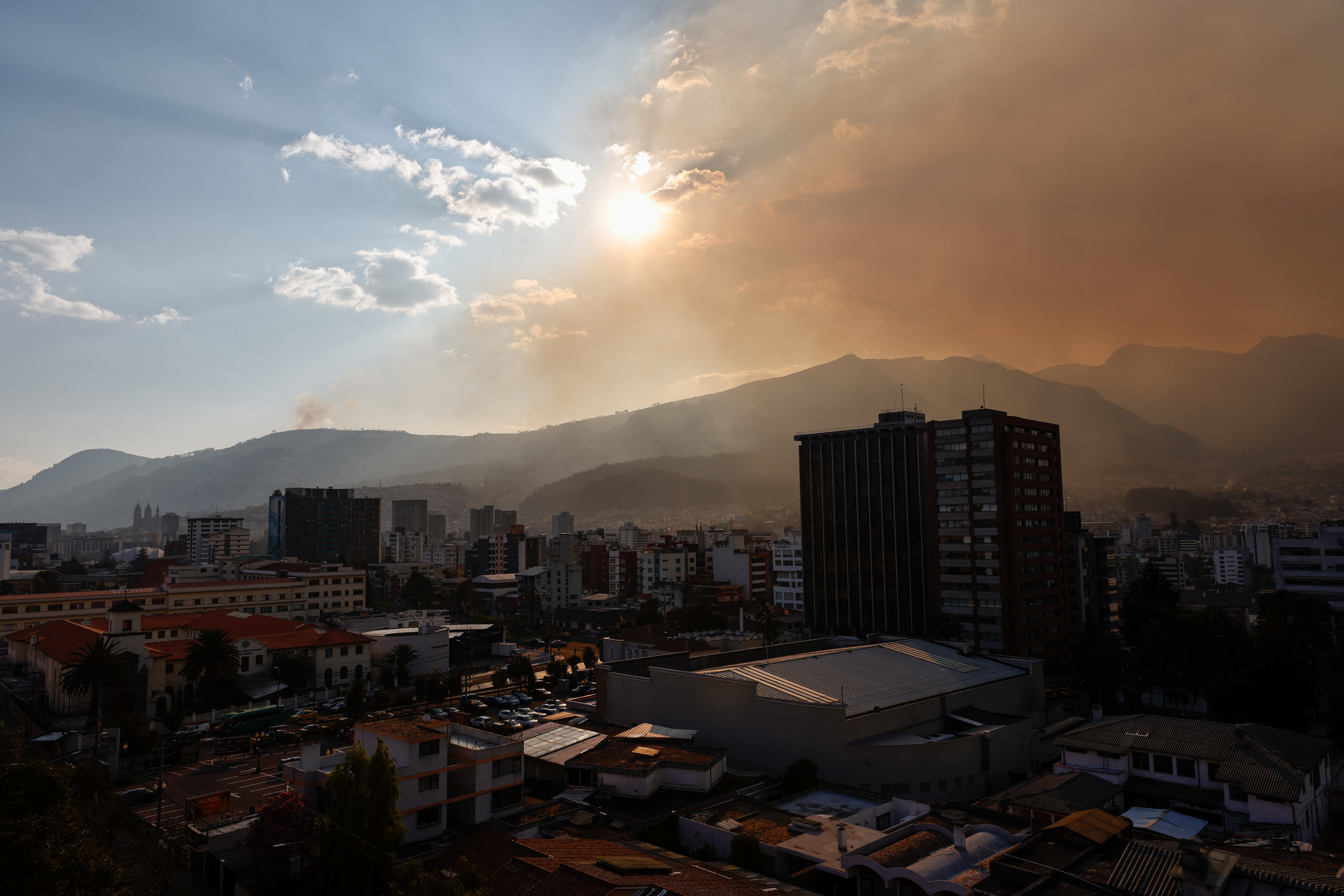 Smoke and ash is seen covering Quito due to wildfires