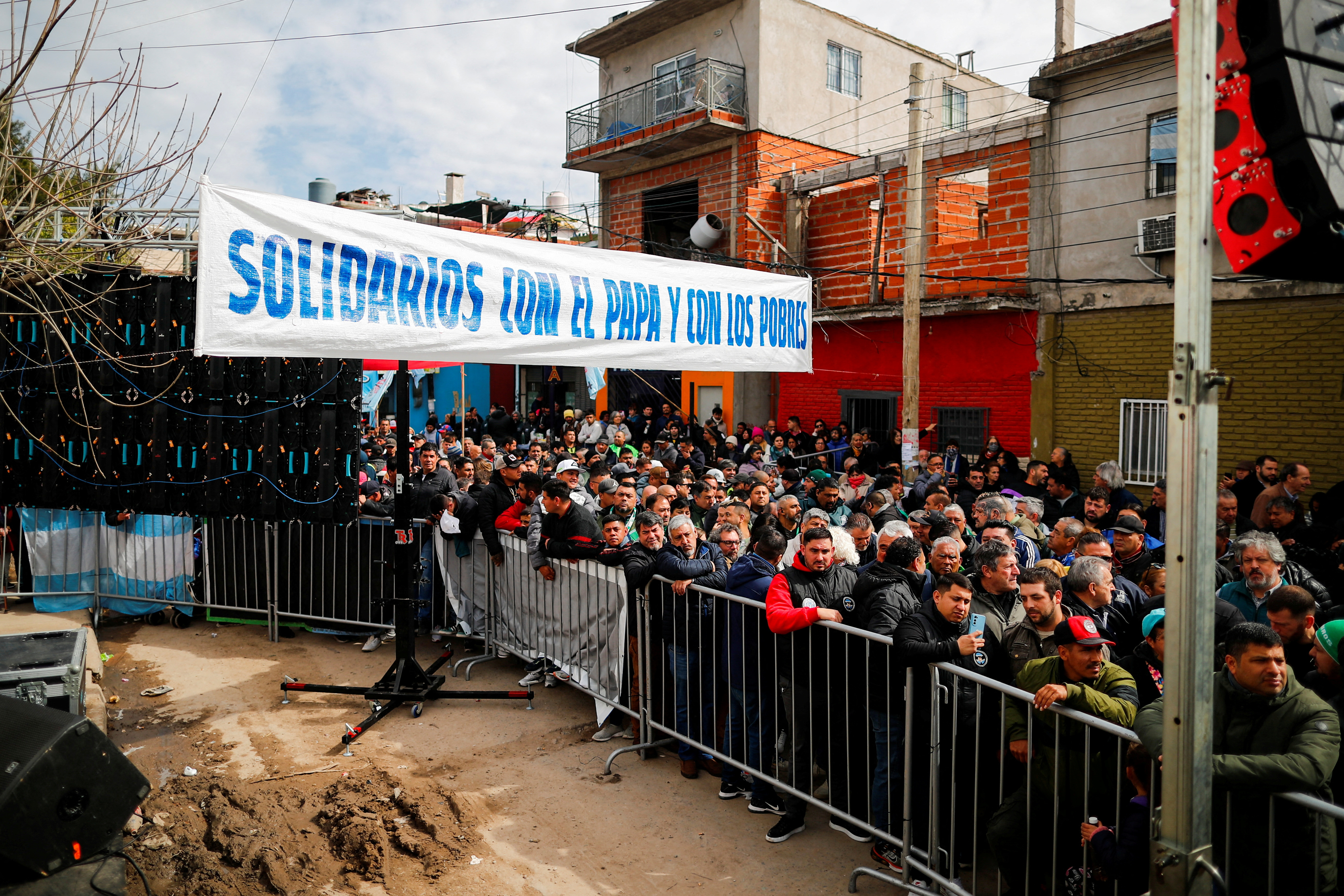 FILE PHOTO: Faithful attend a mass to rebuff attacks on Pope Francis by presidential candidate Javier Milei, in Buenos Aires