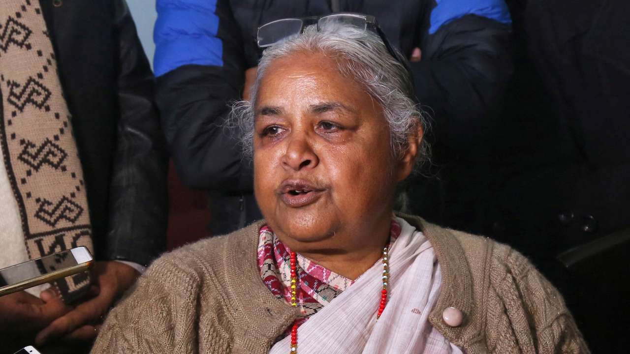 Nepal's former Chief Justice Sushila Karki speaks with the media after meeting Doctor Govinda KC, in Kathmandu