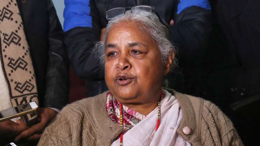 Nepal's former Chief Justice Sushila Karki speaks with the media after meeting Doctor Govinda KC, in Kathmandu