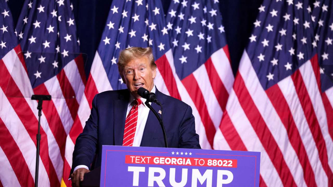 FILE PHOTO: Former U.S. President Trump hosts a campaign rally, in Rome, Georgia