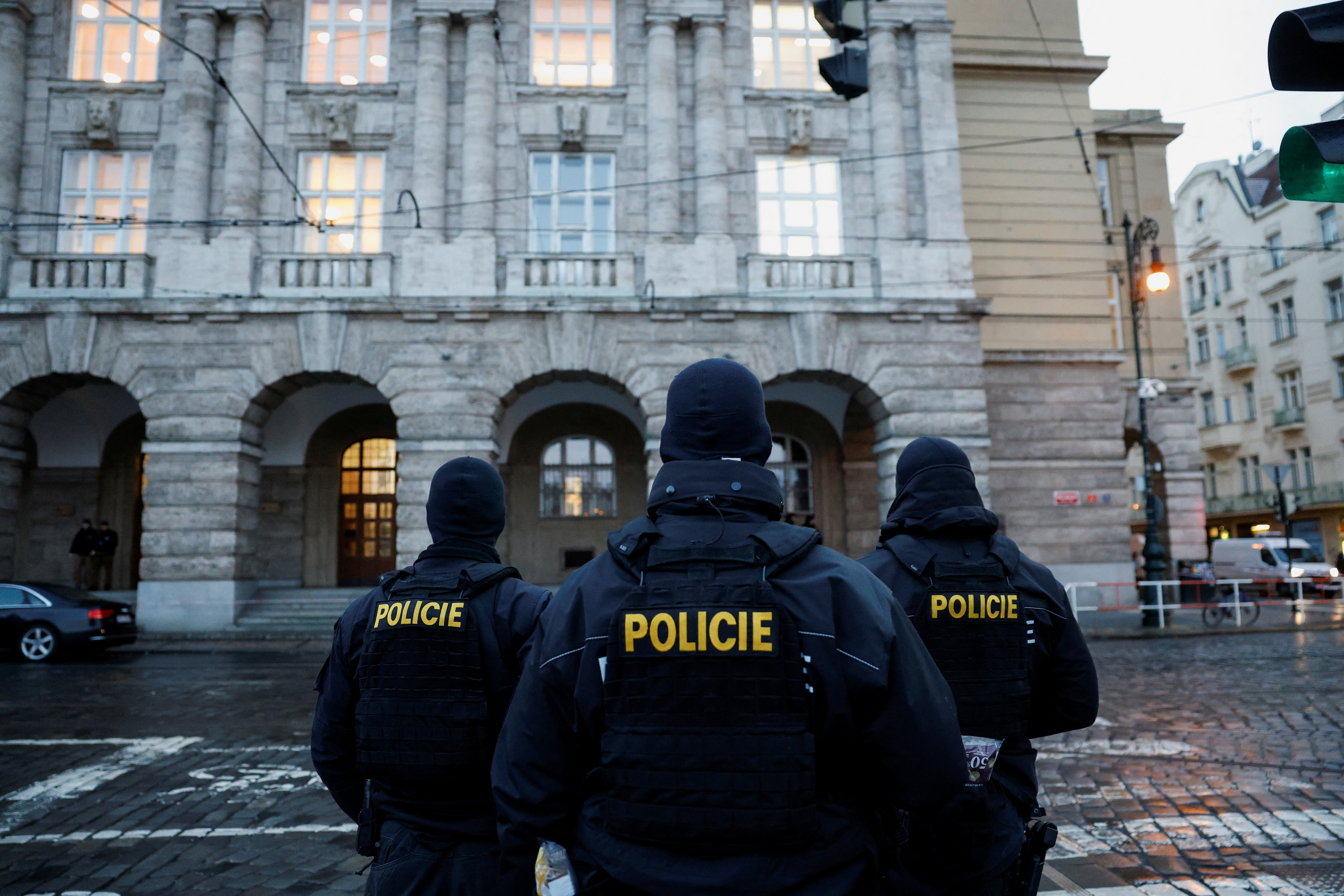 Members of the Police stand guard following a shooting at one of Charles University's buildings in Prague