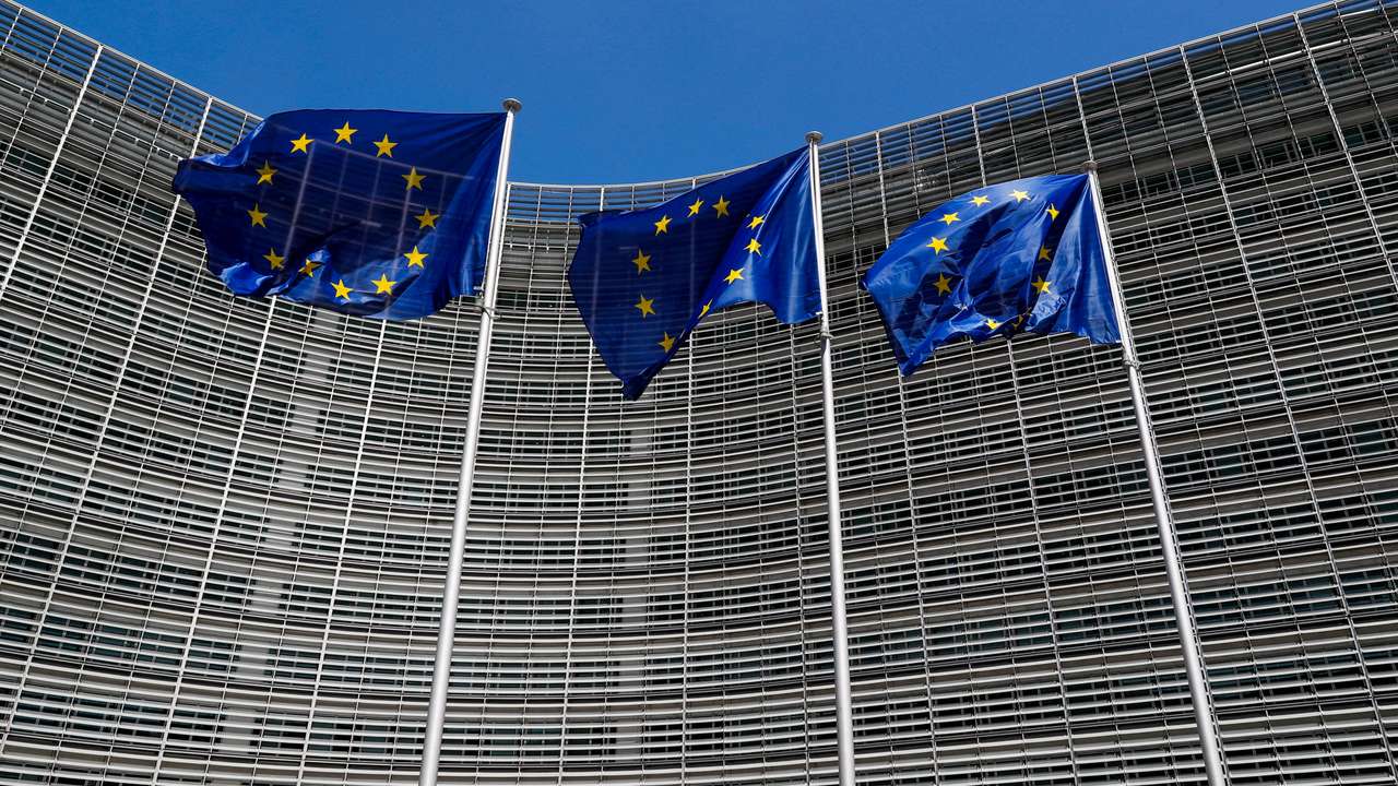 FILE PHOTO: European Union flags flutter outside the EU Commission headquarters in Brussels