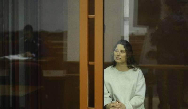 Russian-American dual citizen Ksenia Karelina, accused of treason, attends a court hearing in Yekaterinburg