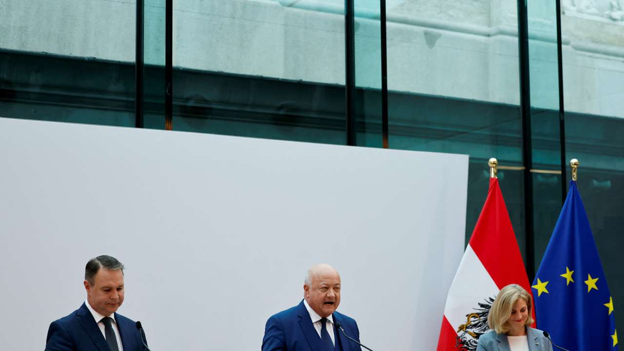 Austrian centrist parties give a press statement after finalizing coalition talks, in Vienna