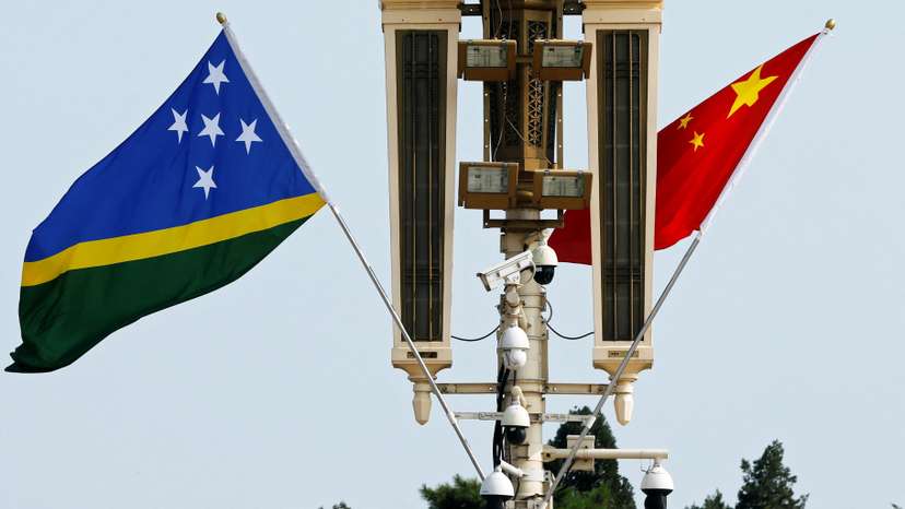 Flags of Solomon Islands and China in Beijing
